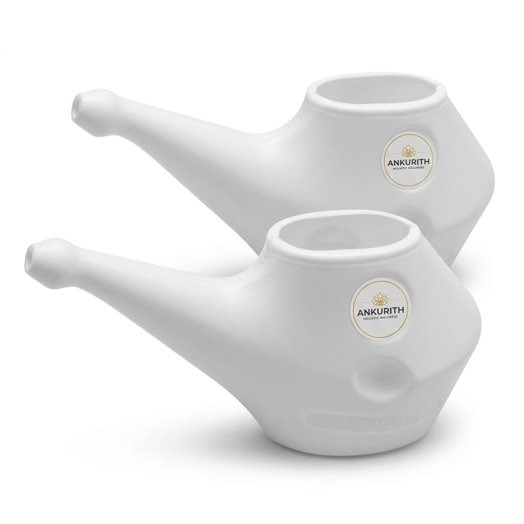 Two Ankurith Jal Neti pots in white, branded with the Ankurith lotus mark